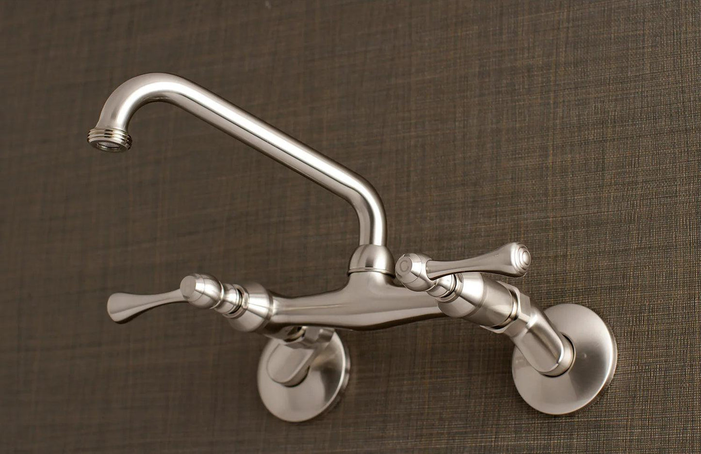 Kingston A Two-Handle 2-Hole Wall Mount Laundry Faucet